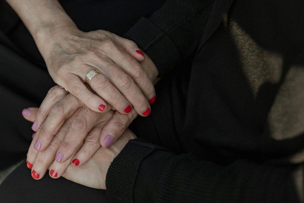 Hands offering support and comfort, representing unity and empathy in times of need.